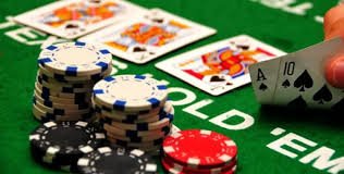 Mobile phone screen showing Asia Gaming table lobby and betting interface