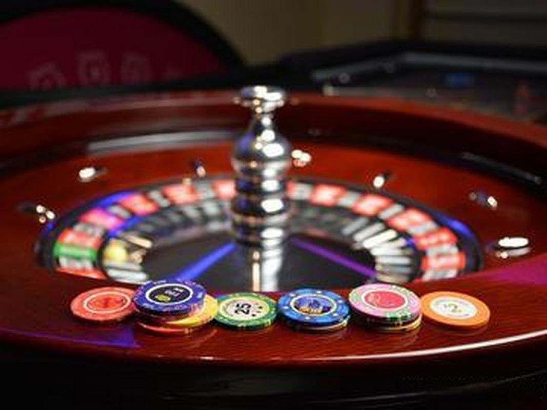 Dragon Tiger card table with dealer in live studio